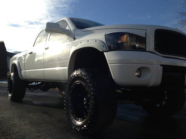 autoaddiction:  2006 5.9 twin turbo megacab Cummins 8 inch long arm lift on 20x12