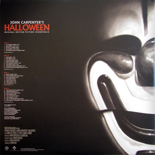 stevesrecords:  John Carpenter ‎– Halloween  Mondo, 2013  **Edition of 1,000 copies with alternate artwork on orange translucent vinyl with black splatter. See the original artwork here.