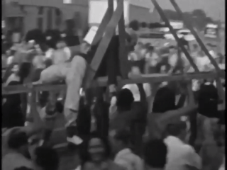 1941 film shows striking animators brandishing a working guillotine at the Disney studio gates