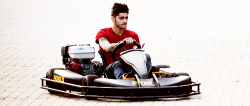 harrystylesdaily:  Zayn Malik was spotted taking a go-kart around just before One Direction’s show in Brisbane. 