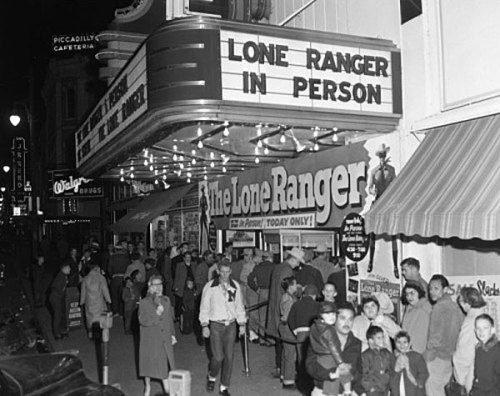 The Lone Ranger, Clayton Moore, makes a personal appearance promoting Warner Brothers’ theatri