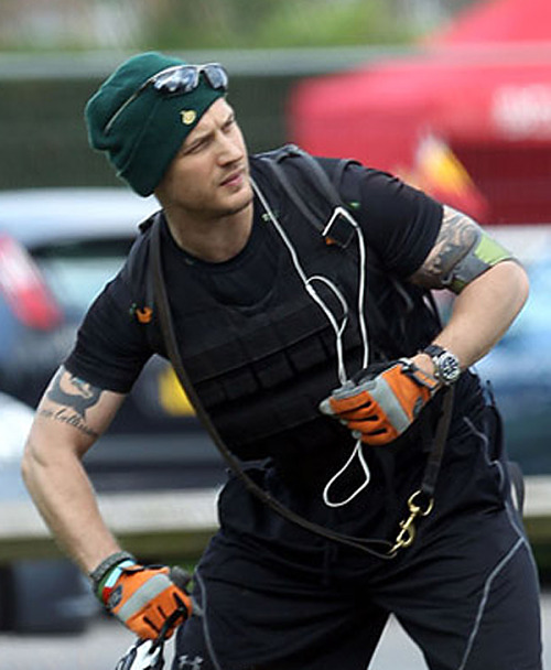 tomhardyvariations: Tom training in a weight vest.