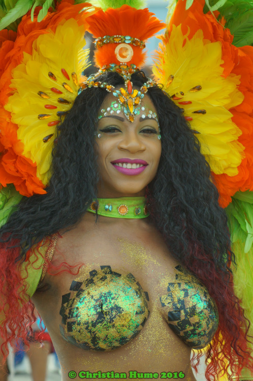   Body painted woman at the 2016 carnival in Port of Spain, Trinidad. Via Portrito.  