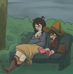 mcsiggy:  witch mom with and her son sit at the park on a cloudy day 