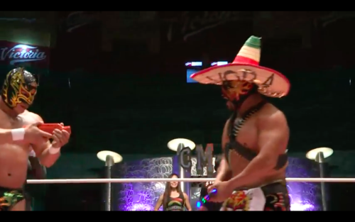 a-luchadork:  Dragon Lee broke Polvora’s toy gun! 