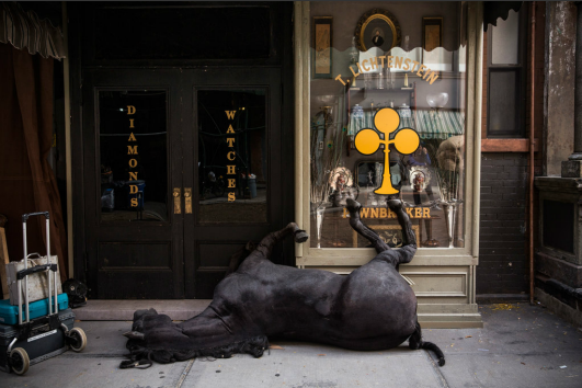 A fake dead horse on the set of a television miniseries being filmed on the Lower East Side of NYC (Photo by Andrew Burton/Getty Images via Lens)