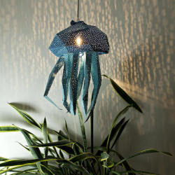 sixpenceee: Inspired by the idyllic Dutch seaside, Amsterdam-based Etsy shop VasiliLights crafts  paper lamp shades exquisitely shaped like  aquatic animals. Specializing in DIY coverings, the shop offers a sea  of easy-to-assemble paper creations that