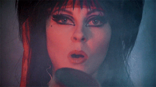 emmyrussum:Cassandra Peterson as Elvira in Elvira: Mistress of the Dark (1988) dir. James Signorelli