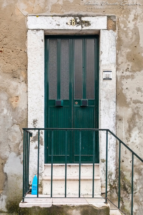 Door in Campo Santa Clara by Andre Vicente Goncalves Door in Campo Santa Clara, Alfama, Sao Vicente,