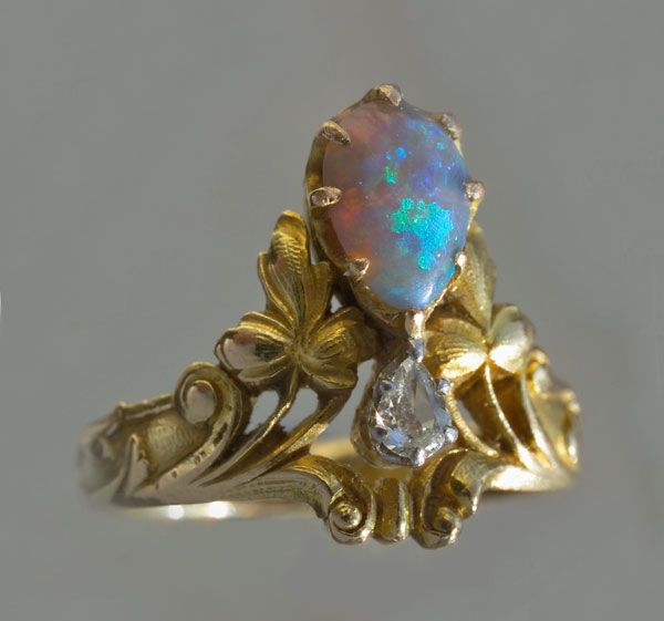 sartorialadventure: Art nouveau diadem ring, made of gold, opal, and diamonds. French,