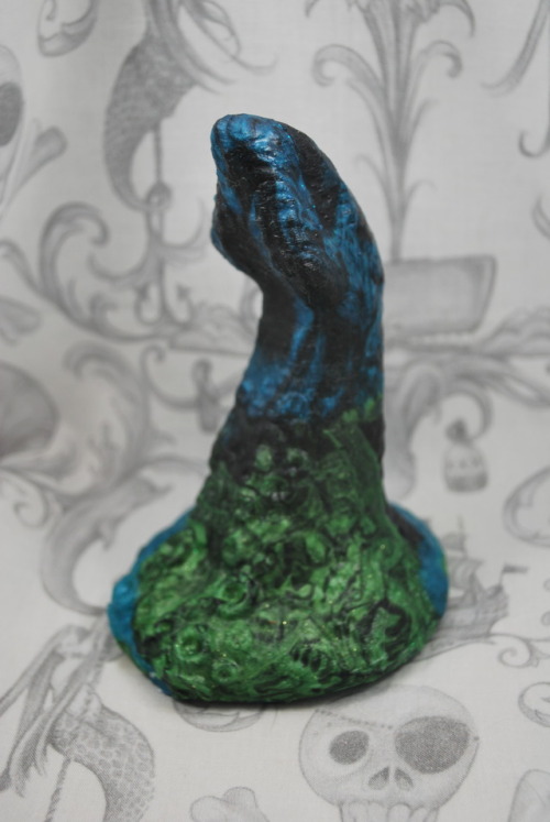 tailsnportholes:Two mini leviathans. One in teal, black and green, and one in teal, black and coral.