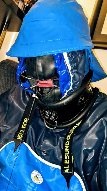 rubberworm:fishermanfaggot:Locked in its Grundens, 66 North and Aalesund rainwear, hoods and gag, a 