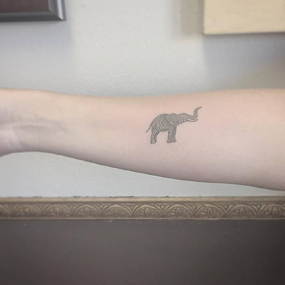 Black Outline Baby Elephant Tattoo On Finger