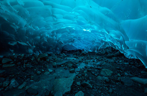 kqedscience:  Inside an Alaskan Ice Cave: Photos  “The Mendenhall Glacier near Juneau, Alaska, is a 12-mile long sheet of ice where visitors can walk across the top of the glacier. The more adventurous can hike four miles to the ice’s edge, where