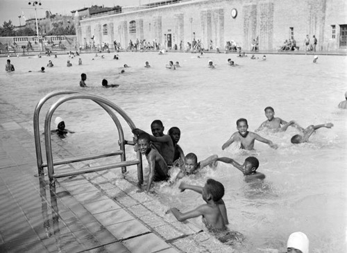 newyorkthegoldenage:  Kids in the swimming pool in Colonial (now Jackie Robinson) Park, Harlem, 1939.Photo: Sid Grossman via MCNY