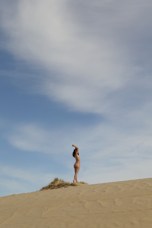 rebeccadimovski:  Enigma. I’ve started noticing two opposites attracting in my works as of recent. The delicate yet graciously constricted female form dancing with how simple and untouched our sacred land is. What i’m essentially doing is forming