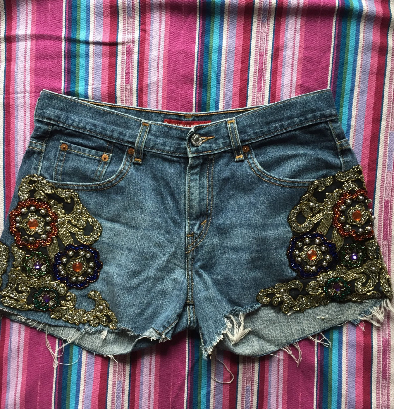 Embroidered and embellished clothing by...