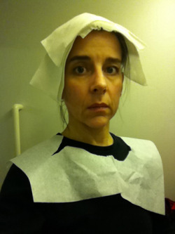 anticonfluentialist-deactivated:  While in the lavatory on a domestic flight in March 2010, I spontaneously put a tissue paper toilet cover seat cover over my head and took a picture in the mirror using my cellphone. The image evoked 15th-century Flemish