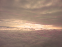 myartfulmoment:A thousand miles over the clouds, to forget about what happens under us.
