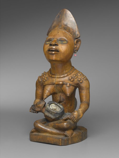 Carved wooden figure of a mother and child (phemba), of the Yombe people, Kongo Central Province, De