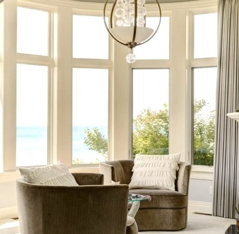 Bedroom - MasterExample Of A Large Beach Style Master Carpeted And Beige Floor Bedroom Design With Blue