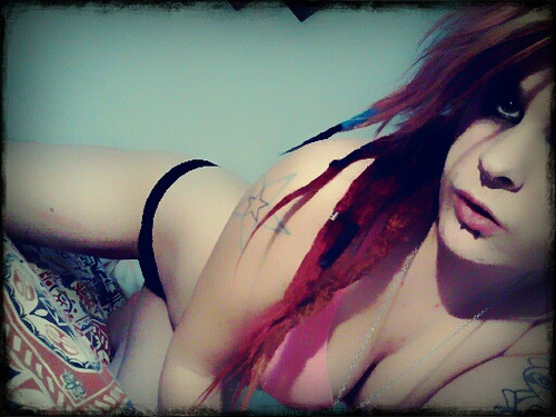 Mygirlfund’s Kawaii showing off her bra and panties in this artistic self-shot pic