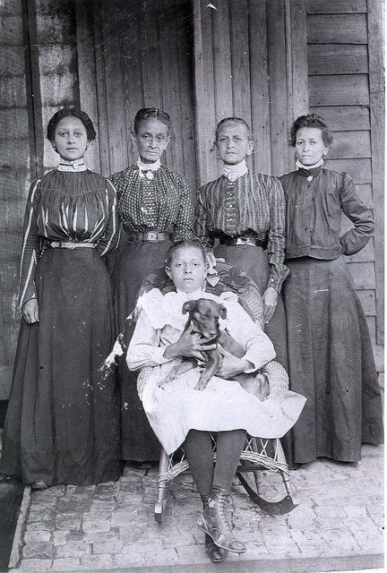 Women of Fauberg Treme, New Orleans and their dog. Faubourg Tremé is the oldest black neighbo