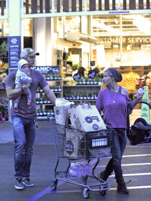 Chris Hemsworth carried his daughter, India while food shopping at Whole Foods in Venice, CA with wi