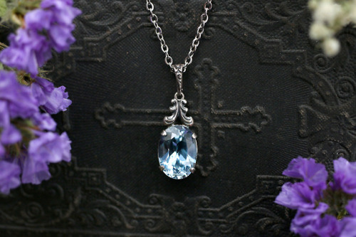 Beautiful old and antique genuine silver necklaces with blue topaz and pearl are available at my Ets