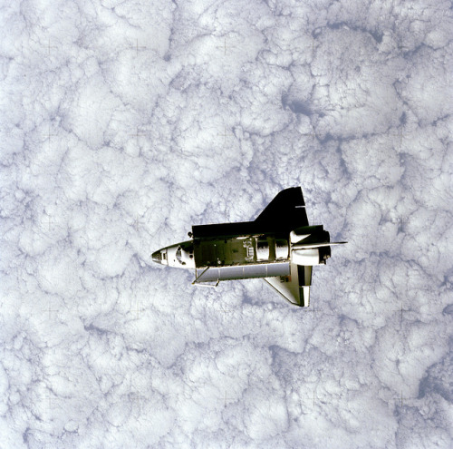 Full view of Space Shuttle Orbiter Challenger in space, taken by the Space Pallet Satellite (SPAS). 