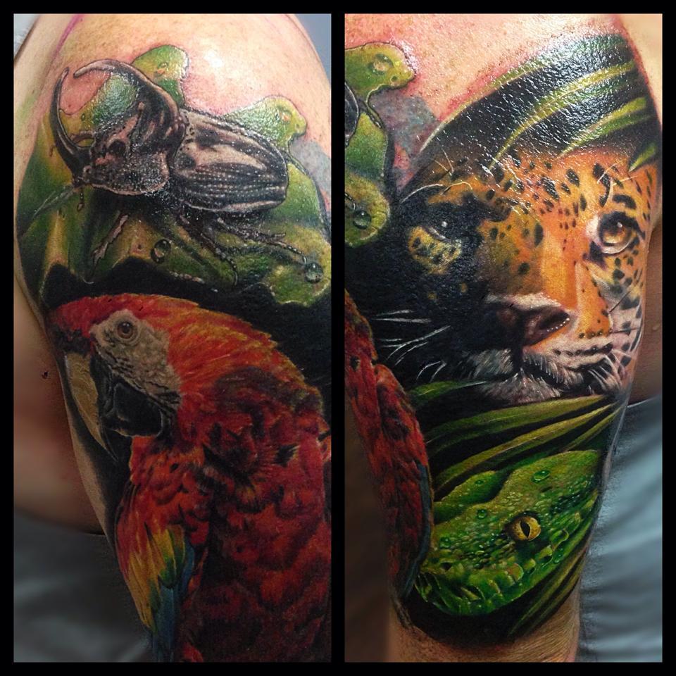 Painful Pleasures - A vivid #jungle tattoo by @kgtattoo76 full of energy  and color. #painfulpleasures #tattoos #jungletattoo #backtattoo #wowtattoos  #colorfultattoos #animaltattoos #tattoocommunity #tattooedlife #inkedlife |  Facebook