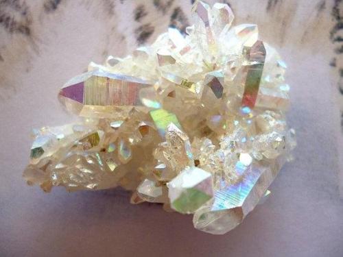 aatmagaialove:  Angel Aura is a quartz crystal. Uses: uplifting spiritual stone that invites angel guidance, deep peace during meditation and purification, promotes joy, light, optimism, activate the throat chakra, find your personal purpose, channel