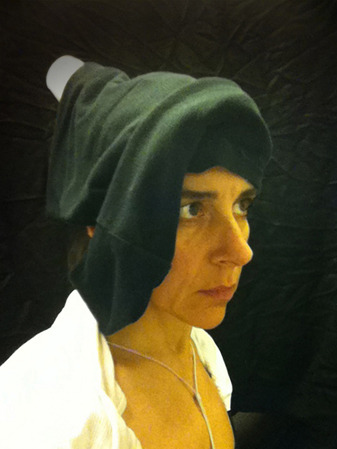 anticonfluentialist-deactivated:  While in the lavatory on a domestic flight in March 2010, I spontaneously put a tissue paper toilet cover seat cover over my head and took a picture in the mirror using my cellphone. The image evoked 15th-century Flemish