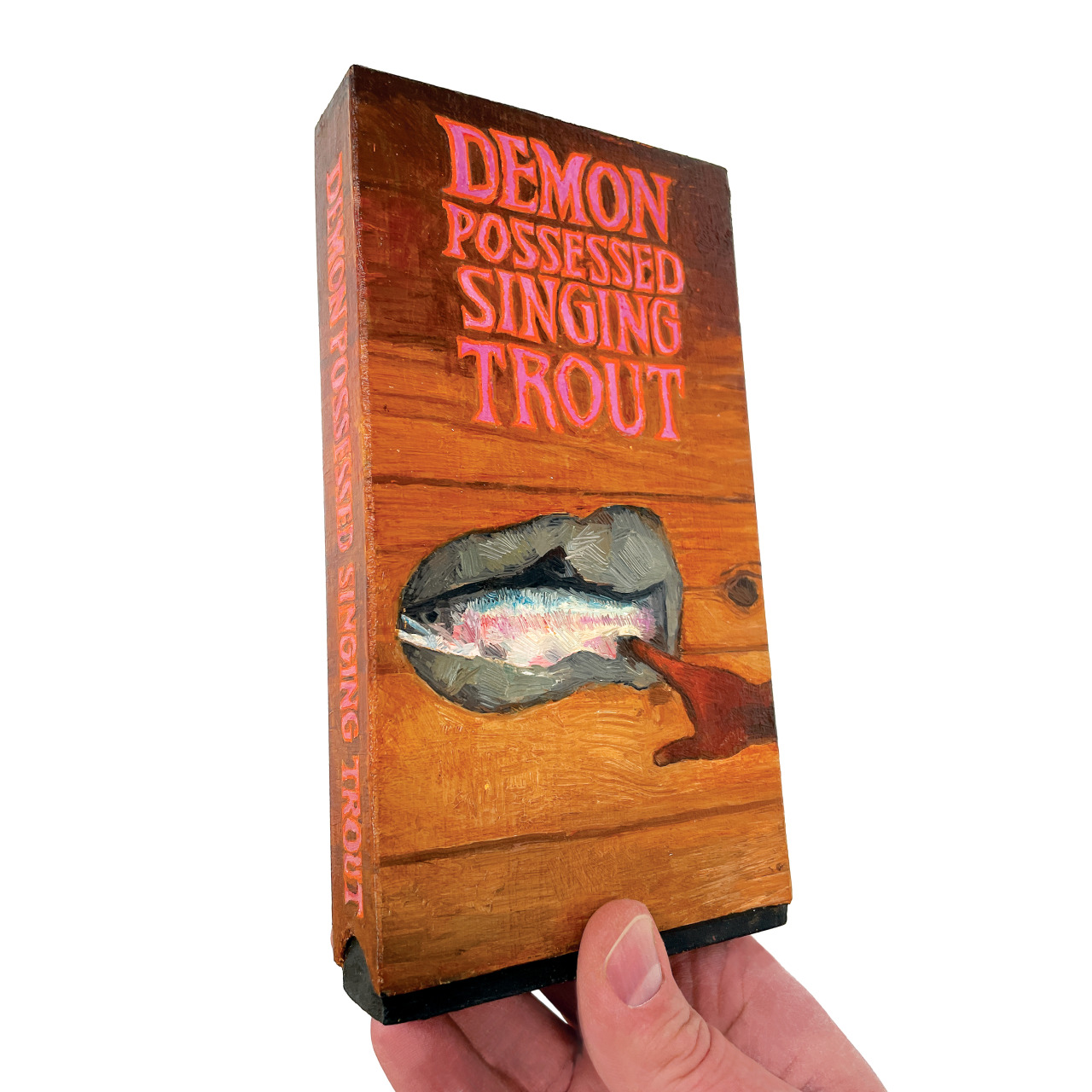 UNTITLED PROJECT: Hi-TOUCH [VHS]
[DEMON POSSESSED SINGING TROUT]
Oil paint on carved wood, 2021