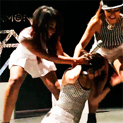 Dinah hitting Lauren in the face with cake +