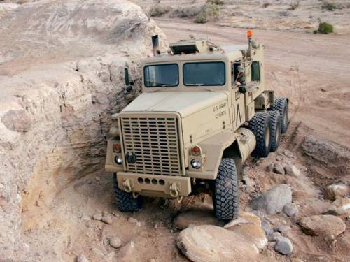 gunrunnerhell:  Custom M920 Built by the creator of the Scorpion  4x4, Soni Honeggar, this surplus M920 was modified into his personal off-road toy, with many parts he fabricated himself. Weighing in at 75,000 pounds (37 tons), the truck has a custom