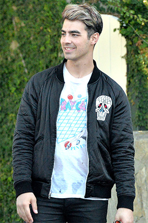 JANUARY 25TH, 2016: Joe Jonas out with friends in Los Angeles, CA. Vintage Stray Cats 1983 Tour T-Sh