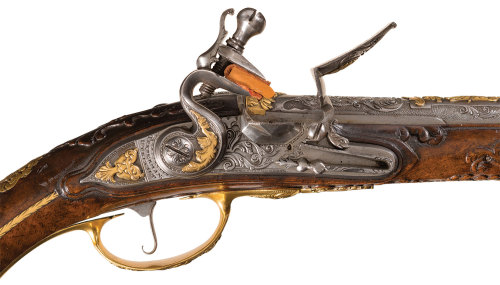 Extraordinarily decorated flintlock pistol crafted by the Dutch gunmakers Girard and Gerrit Penterma