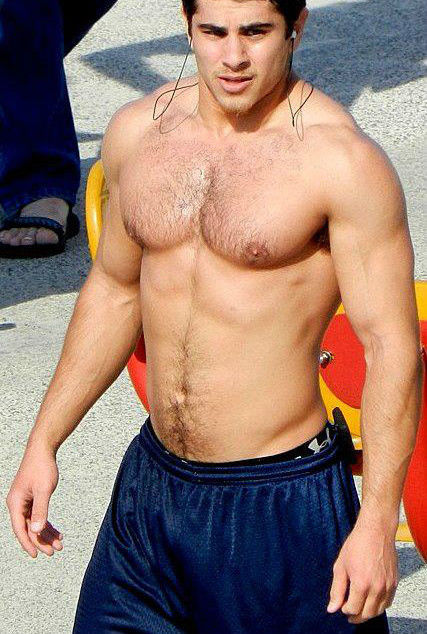 muscletits:  Parading around, thinking himself as being a real man’s man.  He will soon learn his place … 
