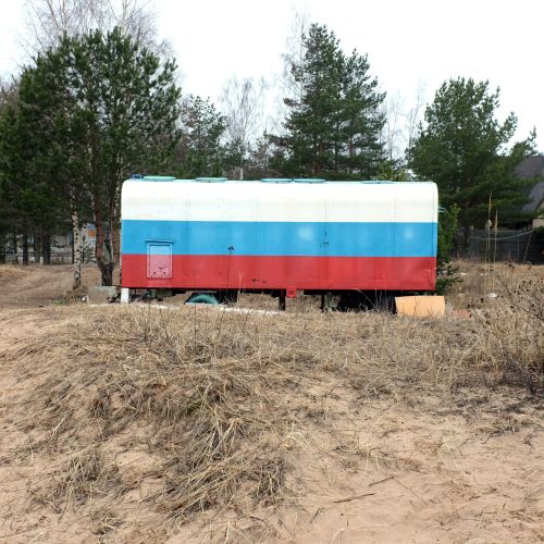 Garage for boats colored in Russian flag on Ladoga Lake | Russia