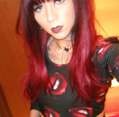 thegirlbornboy:  Loving this new color in my hair. What do you guys think? I’m so prone to sticking with black, but i might keep the faded red tones :)  