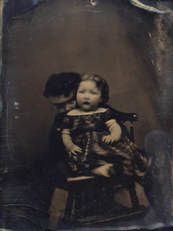 sixpenceee:Can you find the hidden mother? In the 1800s it was very common for mothers to be covered in fabric during children’s portraits to hold the children and keep them comforted. ANOTHER SPOOKY VINTAGE POST