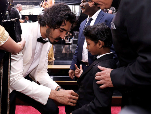 devpatels:Dev Patel buttoning up Sunny Pawar’s suit at the 89th Annual Academy Awards at Holly