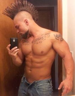 Nice Mohawk and tattoos.