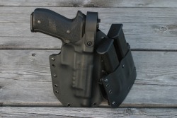 northwestnorthlanders:  Multiple shots of my Mk25 in a Bravo Concealment Lvl II. Great holster, mag holster.  