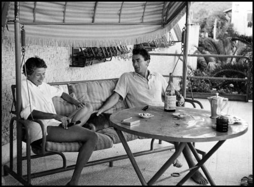 blackpicture: David Seymour Ingrid Bergman and Gregory Peck sitting on a swing. Santa Marinella. Ita