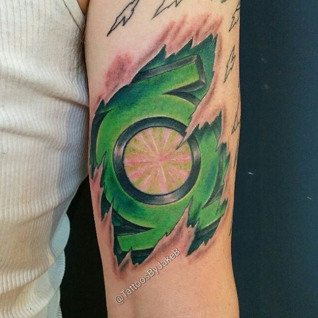 Green lantern tattoo by Wes Fortier | Green lantern tattoo, Lantern tattoo,  Black tattoo cover up