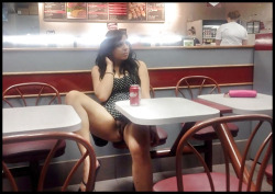 carelessinpublic:  In a short dress inside a restaurant and showing her pussy