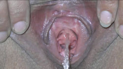 klrspussy:  Peeing while holding my labia open so you can clearly see my urethra by request.  I must admit, this is the first time I’ve ever seen it myself!  lol  Kind of weird and hot at the same time.  =)See all of my personal pussy, pee and ass