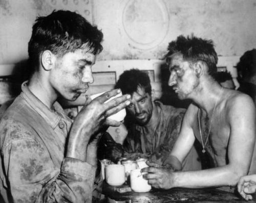 19-year-old PFC Faris “Bob” M. Tuohy (left) and his comradesenjoying a cup of coffee after two days 